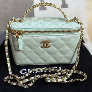 Brand New CC Vanity Case with mirror mint green comes with the dust bag. GWP